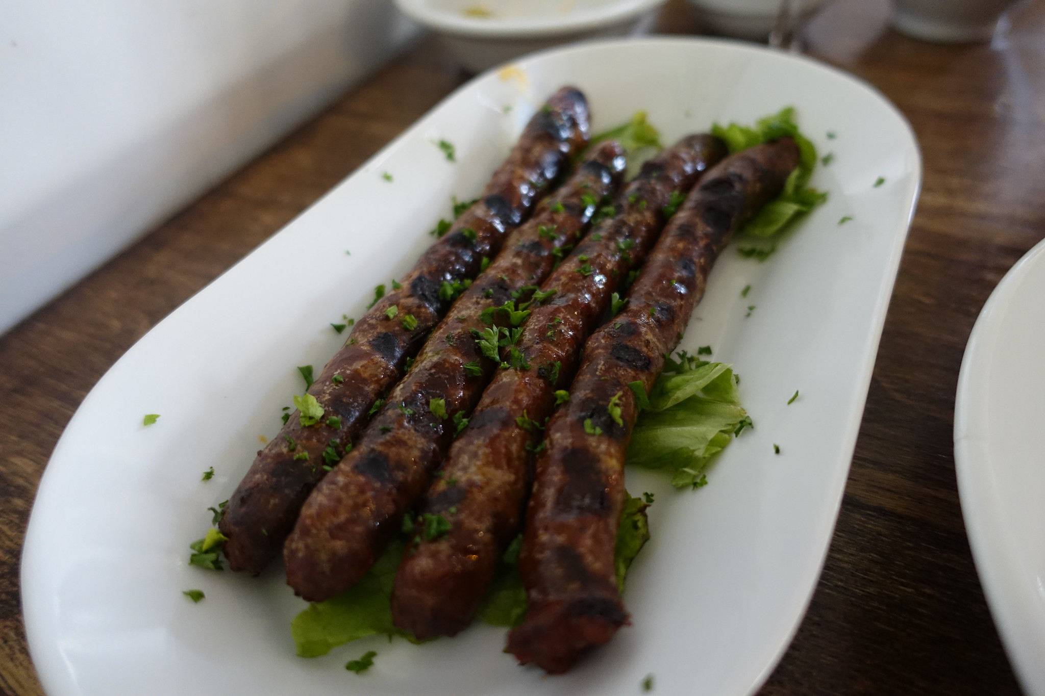 Merguez grillées - Photo de Guilhem Vellut - 101Pairing.com