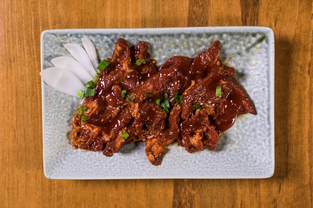 Porc effiloché avec une sauce barbecue à la moutarde
